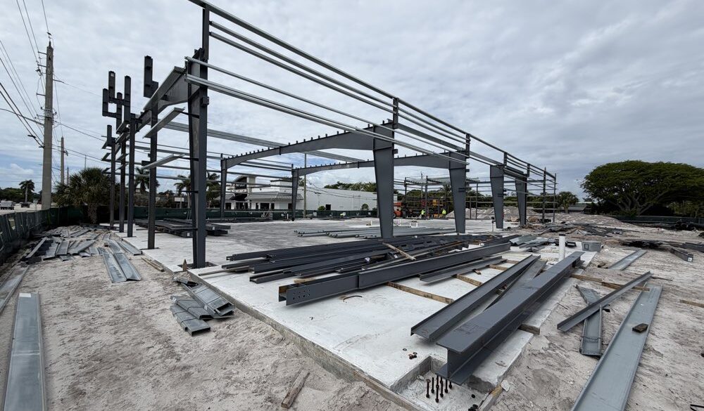 Retail showroom pemb structure steel erection.