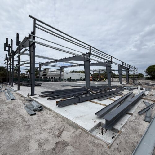 Retail showroom pemb structure steel erection.
