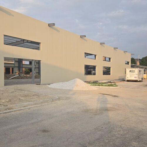 Installed metal wall panels that are insulated for Harbor House