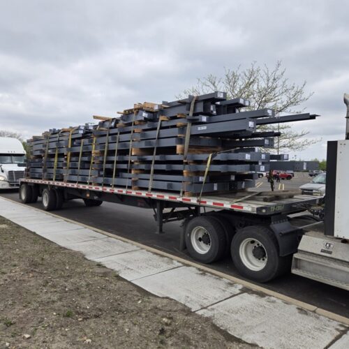 Labeled steel components fast construction Harbor Haus in Saint Charles, Illinois.