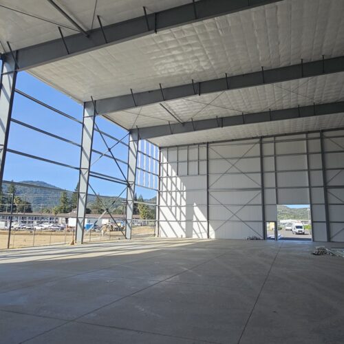 Column-free interior of a metal storage building.